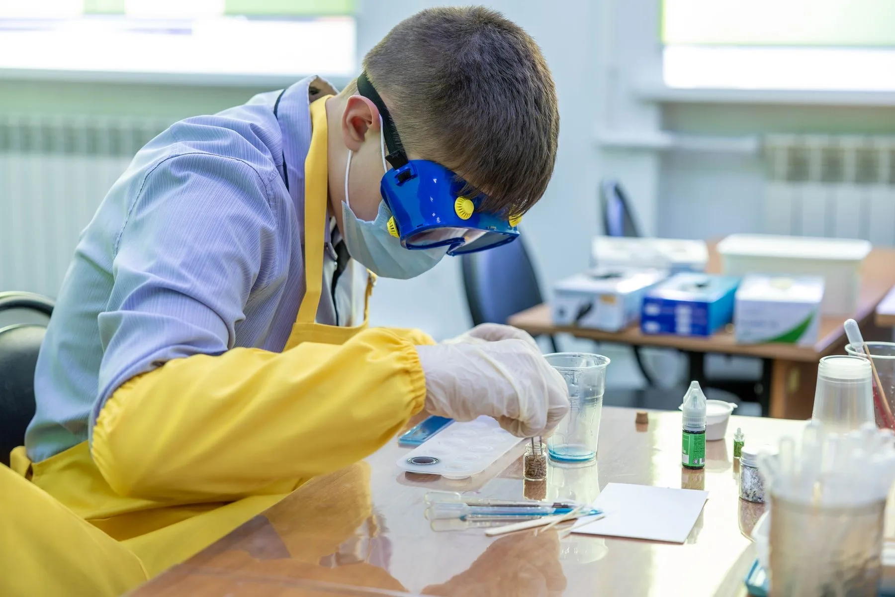 A student running a chemistry experiment